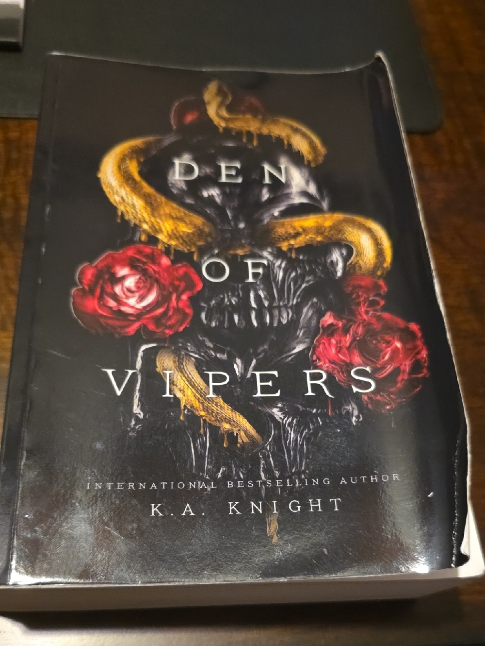 Kenzo Black Book Cover with Gold Snake and Red Roses